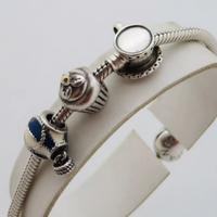 PANDORA BRACCIALE MOMENTS IN ARGENTO 925 +4 CHARMS