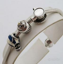 PANDORA BRACCIALE MOMENTS IN ARGENTO 925 +4 CHARMS