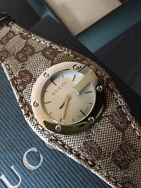 Orologio GUCCI con cinturino tessuto GG canvas