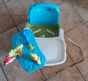 seggiolino alzasedia marca Fischer price 