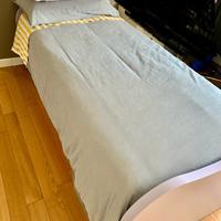 Letto simgolo con altro letto estraibile