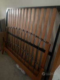 Letto matrimoniale e lavaasciuga/lavatrice