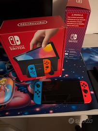 Nintendo switch oled blu/rosso neon, perfetta