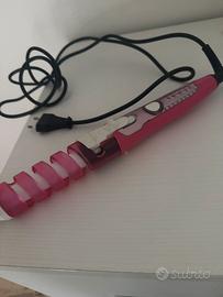 Arricciacapelli a spirale rosa