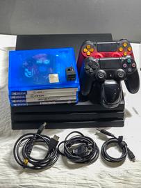 Consolle ps4 pro +2 controller +5 giochi + caricab