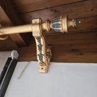 Bastone in legno dorato 