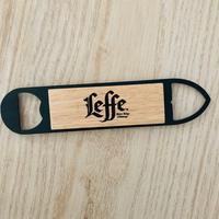 Apribottiglie Leffe in legno e acciaio nuovo mai