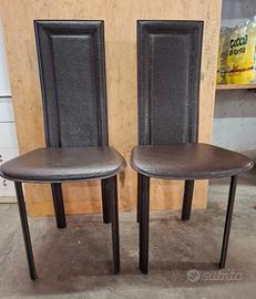 coppia di sedie in pelle