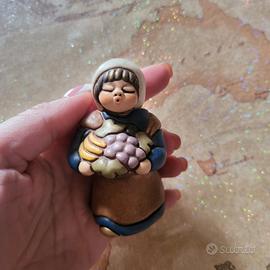 thun donna con frutta blu fp presepe
