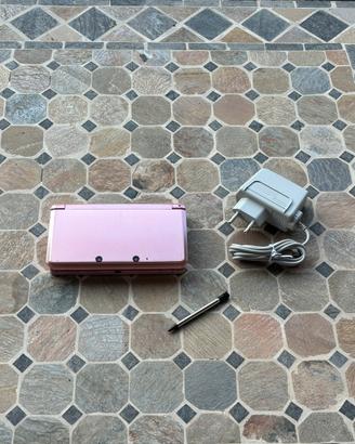 Nintendo 3DS rosa con pennino e caricabatterie