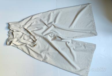 pantaloni bianchi a zampa 