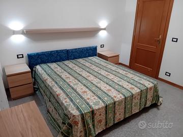 Camera matrimoniale in appartamento condiviso