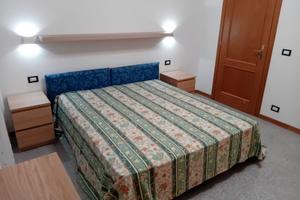 Camera matrimoniale in appartamento condiviso