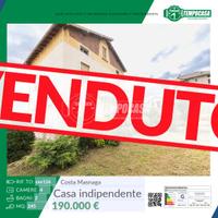 Bifamiliare con giardino e box