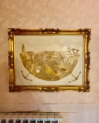 Quadro elegante con cornice oro
