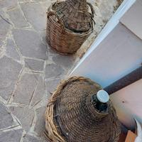 Damigiane di vetro rivestite