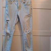 Pantaloni jeans skinny strappati 