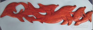 Delfini in legno