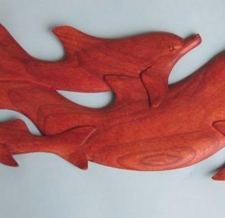 Delfini in legno