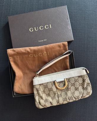 Pochette in tela monogram e pelle marca Gucci