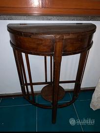 Consolle mezza luna virgola tre gambe
Misure
67/34