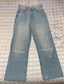 Pantaloni jeans strappati