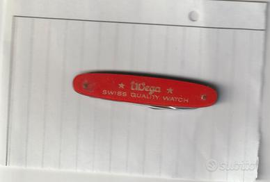 COLTELLINO PUBBLICITARIO WEGA SWISS QUALITY WATCH