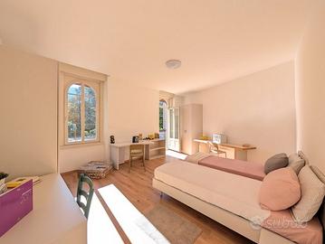 Stanza doppia ad uso singolo con balcone da sett