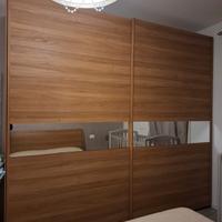 Camera da letto e armadio.