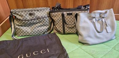 borse Gucci Vuitton Chanel Versace Burberry 