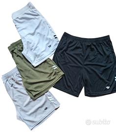 Set da 4 pantaloncini sportivi uomo. Taglia 2 XL.