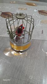 cabbia di uccellino meccanico che cante a  pile 