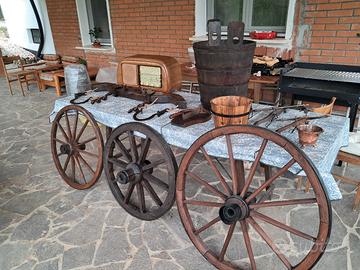 Antiquariato,giogo,ruote calesse carro,radio ecc