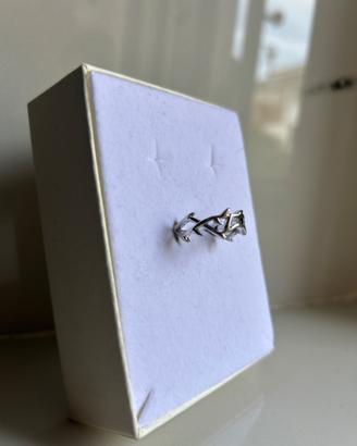 Anello argento con design di delfini intrecciati