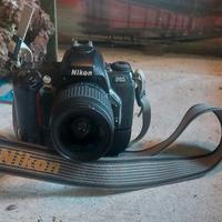 Fotocamera Nikon f65 con obbiettivo nikkor 