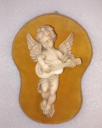 putto con chitarra