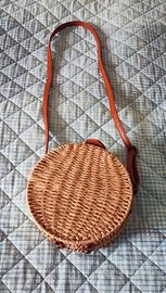 Borsa rotonda in paglia usata poco