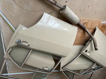 Portiere e scarico x alfetta 1800 prima serie