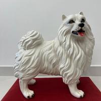 statua 