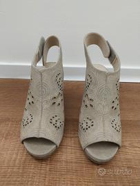 Sandali eleganti con tacco alto