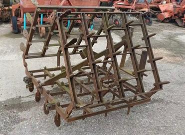 Erpice pieghevole per trattore agricolo