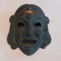 maschere greche in bronzo