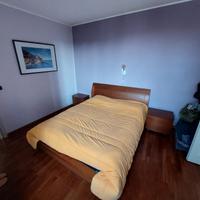 camera da letto in legno massello