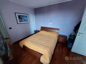 camera da letto in legno massello