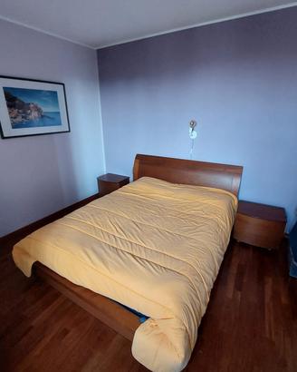 camera da letto in legno massello