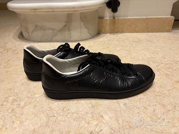 Sneakers Gucci in pelle nera monogram GG