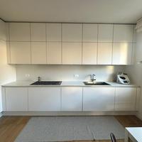 Cucina bianca Poggenpohl, elettrocomestici Miele