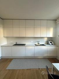 Cucina bianca Poggenpohl, elettrocomestici Miele