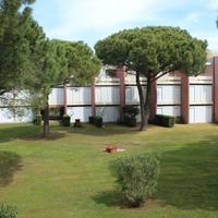 Bilocale con veranda in residence con piscina