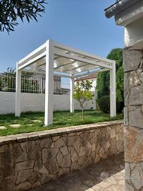 Gazebo in legno con teli ad onda